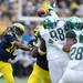 Michigan senior quarterback Denard Robinson attempts to get a pass through Michigan State defense during the second quarter against Michigan State at Michigan Stadium on Saturday afternoon. Melanie Maxwell I AnnArbor.com